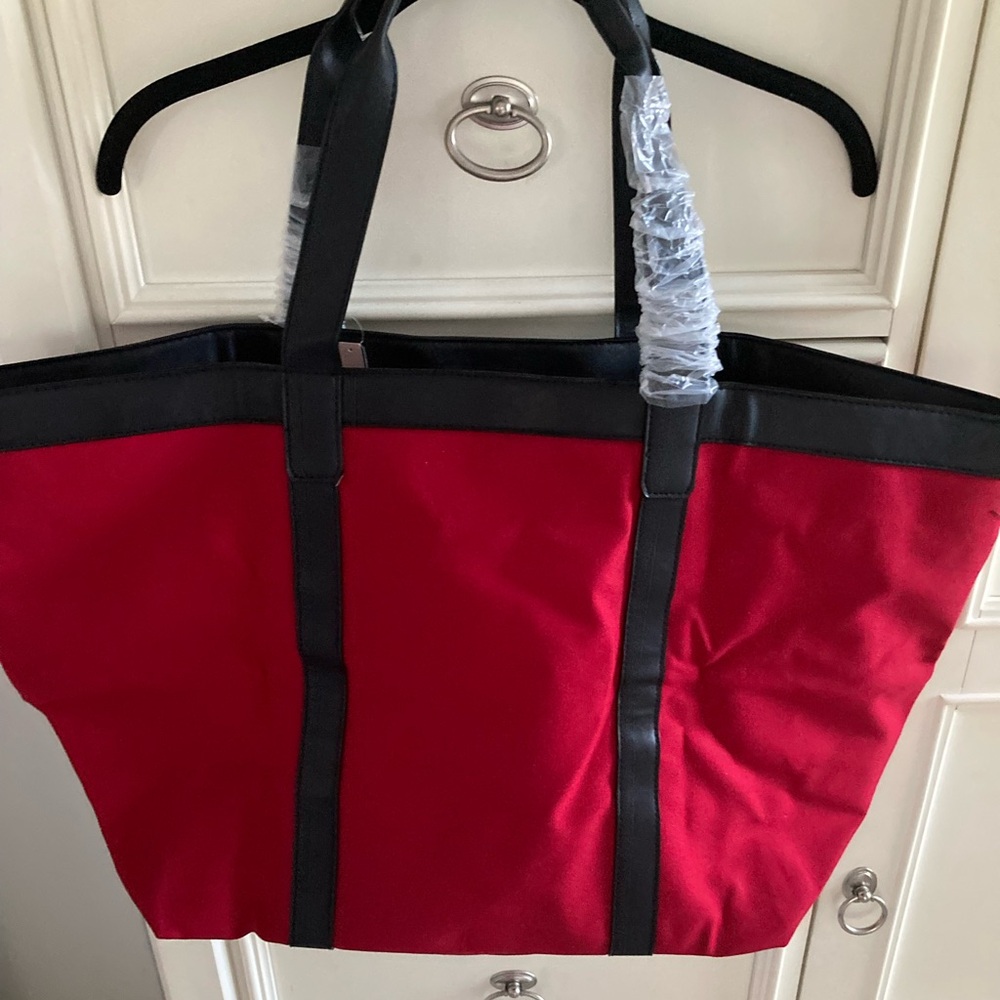 PRICE REDUCED
LARGE VICTORIA SECRET TOTE
NEW WITH TAGS. - Picture 4 of 6